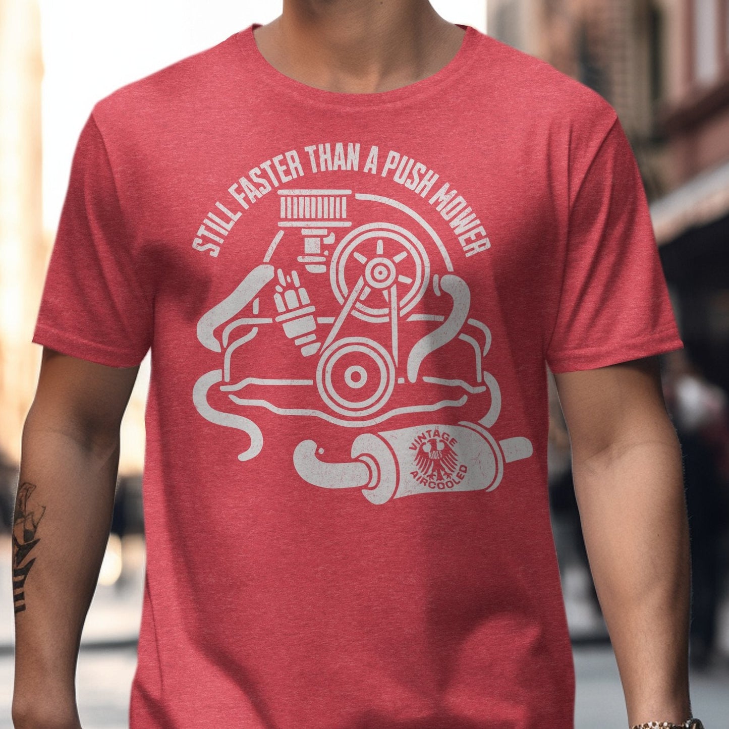 Still Faster Than a Push Mower Graphic T-shirt product type